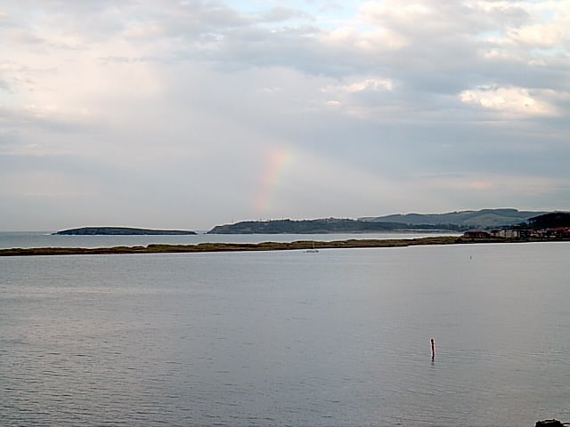 Arco Iris sobre el Puntal de Somo by Tiopelos