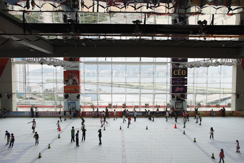 Megabox Ice Rink and the Kai Tak Runway by Faintlightofdawn