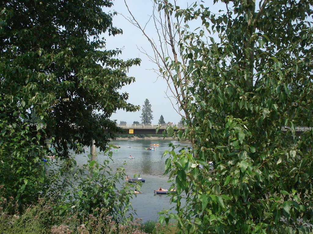 The Shuswap River, Enderby, B.C., floaters keeping cool. Unfortunately there is a lot of smoke in the air from all the fires burning in the province right now. by Laurel211