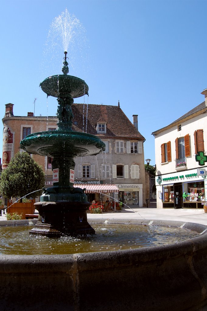 A fountain in the center of Saint Pourcain sur Sioule, France by © Andre Speek