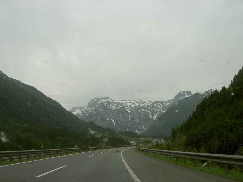 Snow on mountains on Tauernautobahn by Palance