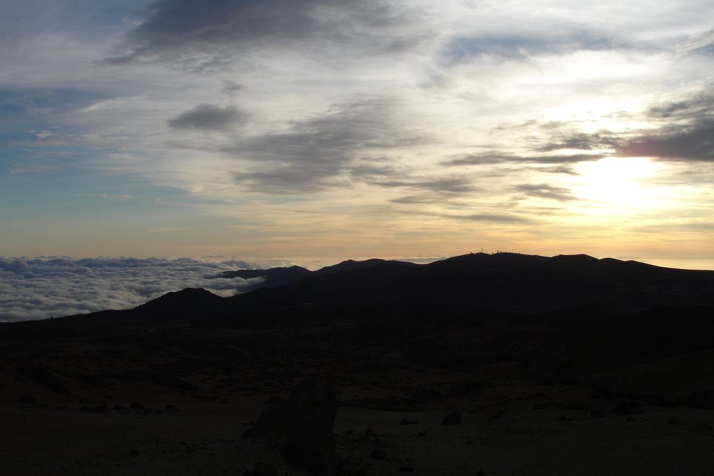 Clouds hug Cumbre Dorsal at sunrise by Tjaart Molenkamp