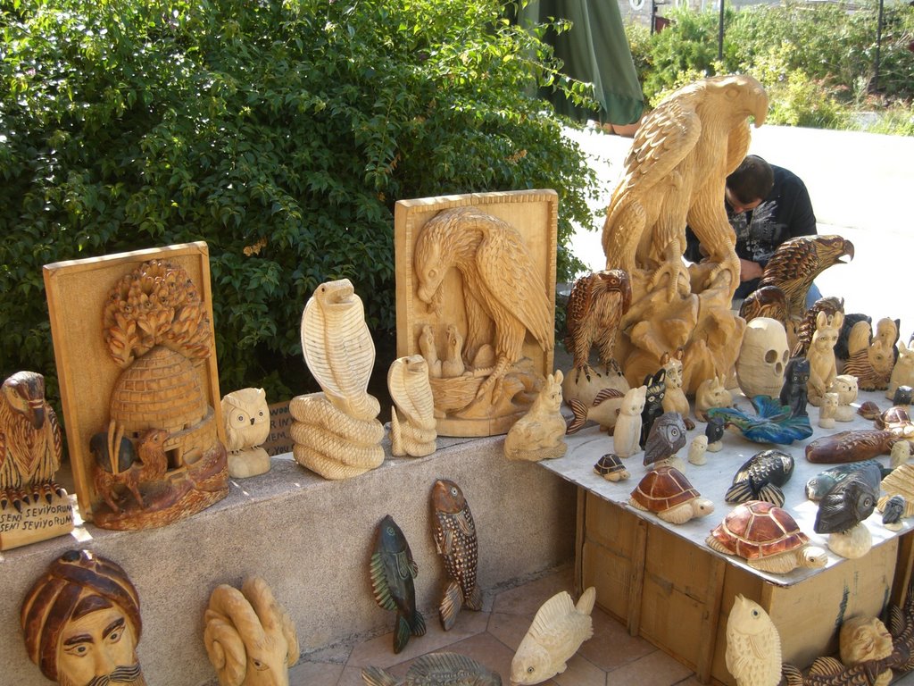 Hand carved wooden animals by mel1952