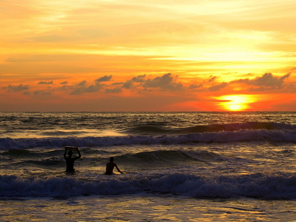 Father and Son waiting for the wave. by tawatchaiwanasri