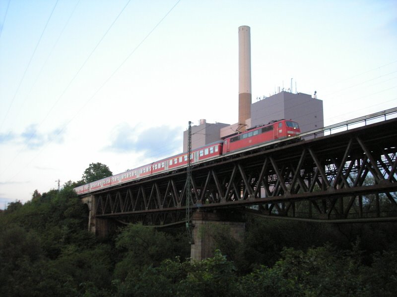 Train in front of the powerplant Großkraftwerk Franken I by Oelgo