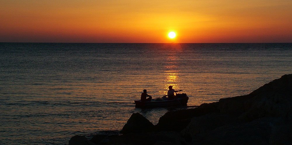 Sunset at Acre Bay by Miguel Nicolaevsky