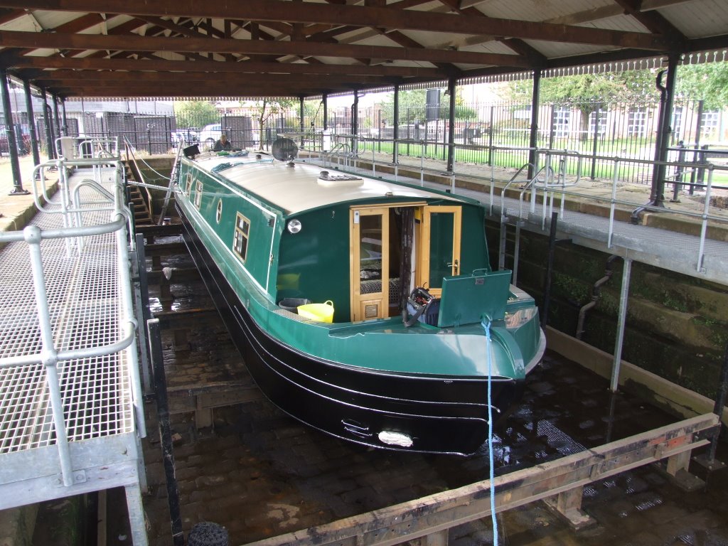 Narrowboat In Covered Drydock Adjacent To The Leeds & Liverpool Canal. by Peter Hodge