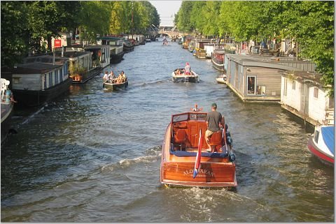 Holland - Boat on a river by ilovetraveling