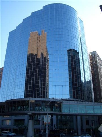 Reflection in office building glass and walkway, Kansas City, MO by Maxine Arnoldy