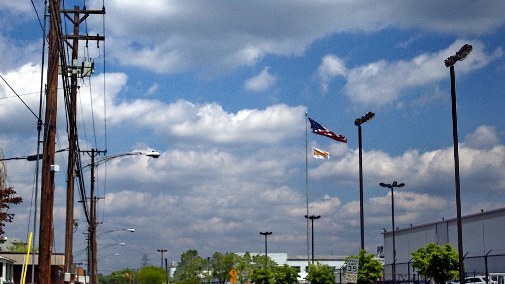 2009 US Flag flutters Leo St. - Dayton, Ohio by Qwilleran