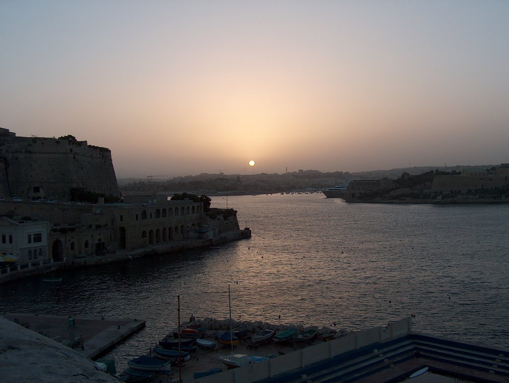 Sunset over Manoel Island and channel by mirogster