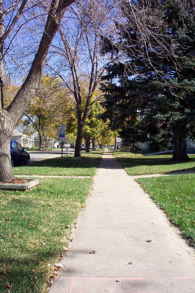 Sidewalk, 300 block E 21st St, looking east by siouxlanta