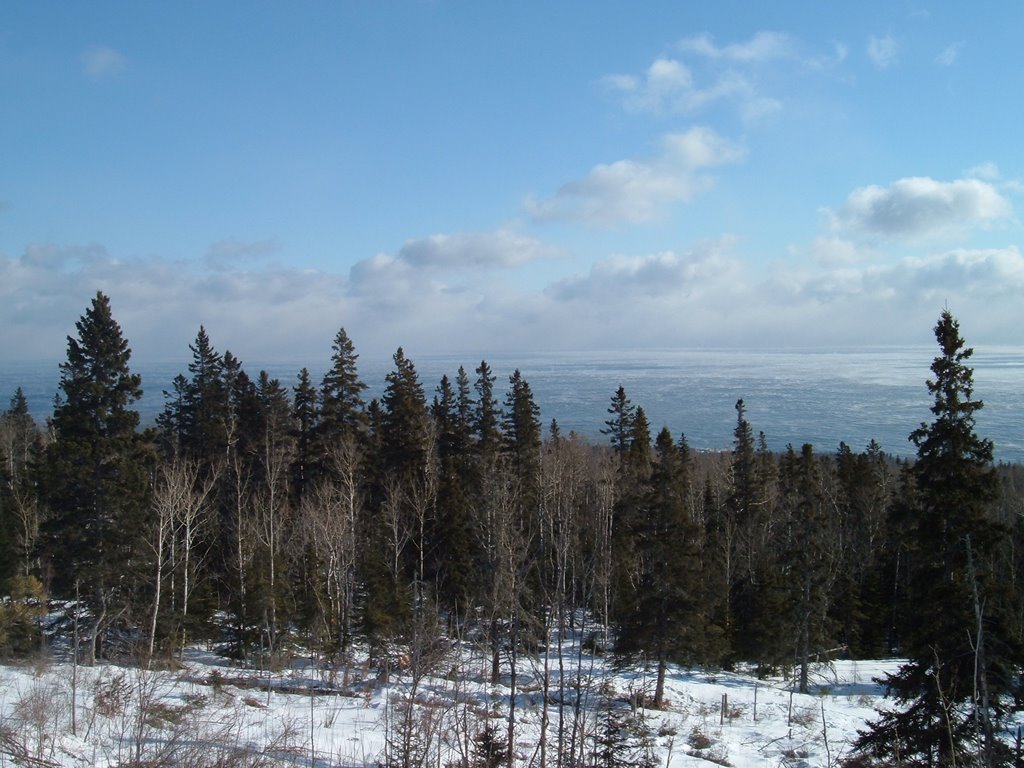 Feb 2006 - Grand Marais, Minnesota. Winter view of Lake Superior from Pincushion Mountain. by BRIAN ZINNEL