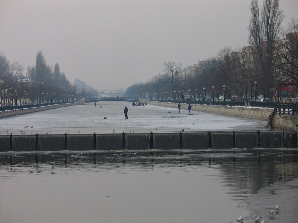 Dangerous fishing on thin ice by George Alexandru Marinescu