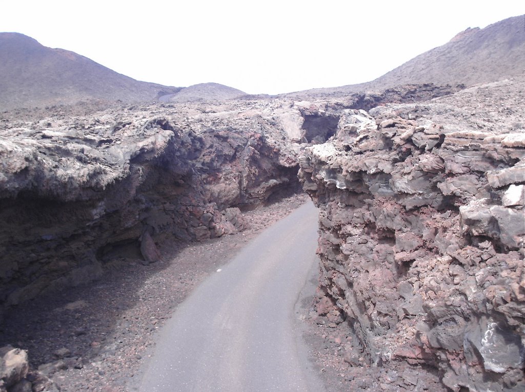 An old lava flow tunnel,now a road.Timanfaya national park,Lanzarote, by Neil Pinch