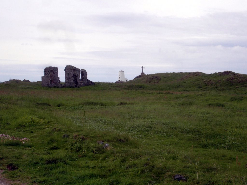 Ruins of St Dwynwen's church and the lighthouse by muba