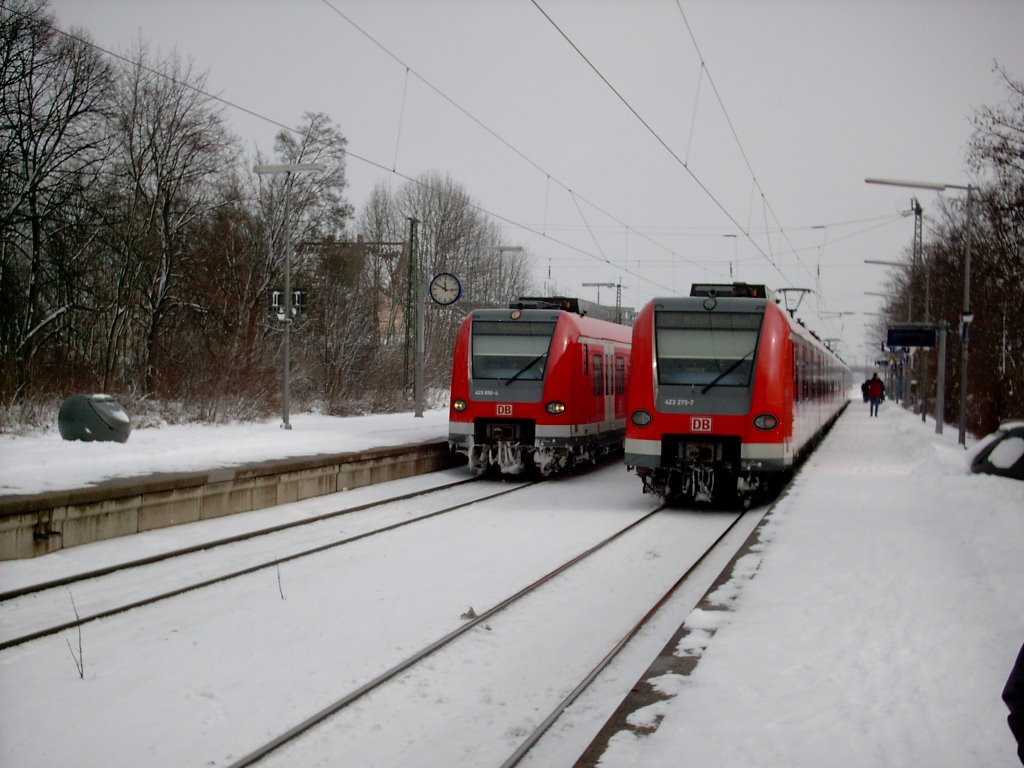 Munich - two red trains by O_Canada