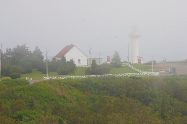 The lighthouse at Sainte-Madeleine-de-la-Riviere-Madeleine by jdwalters