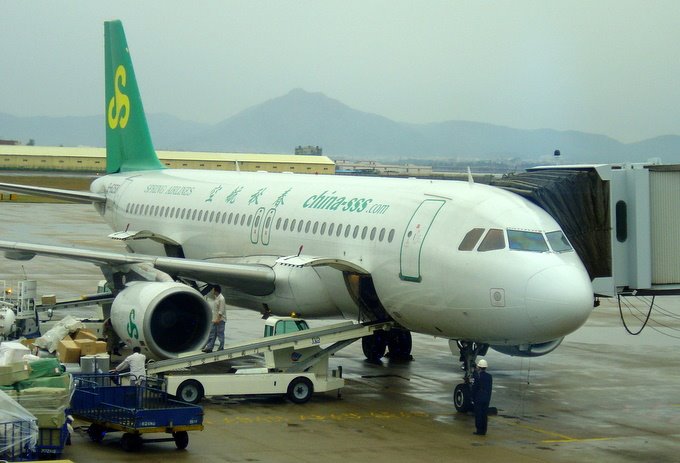 Chinese budget airline on the tarmac at Xiamen Airport by follash