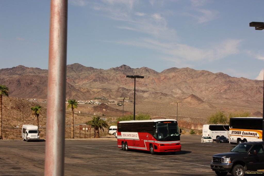 La Hacienda Parking Lot Sight. by Roberto Lam