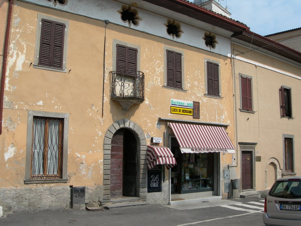 Tobacco and newspaper shop in Adrara by randagino