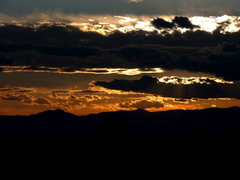 Sunset behind the mountain range by Kai Wedemeyer