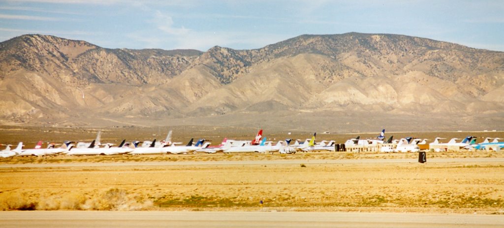 Row of jets stored at Mojave by John McCall