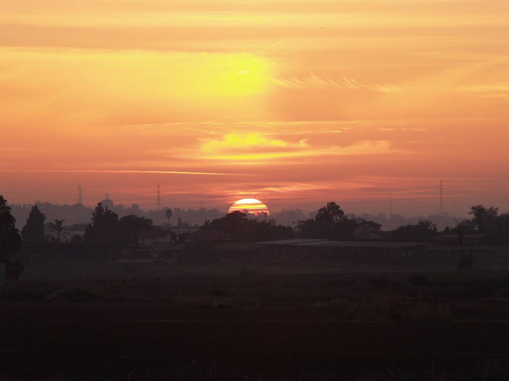 Sunset over Beer Tuvia, From Kiryat Malakhi by Vladimir Kopolovich