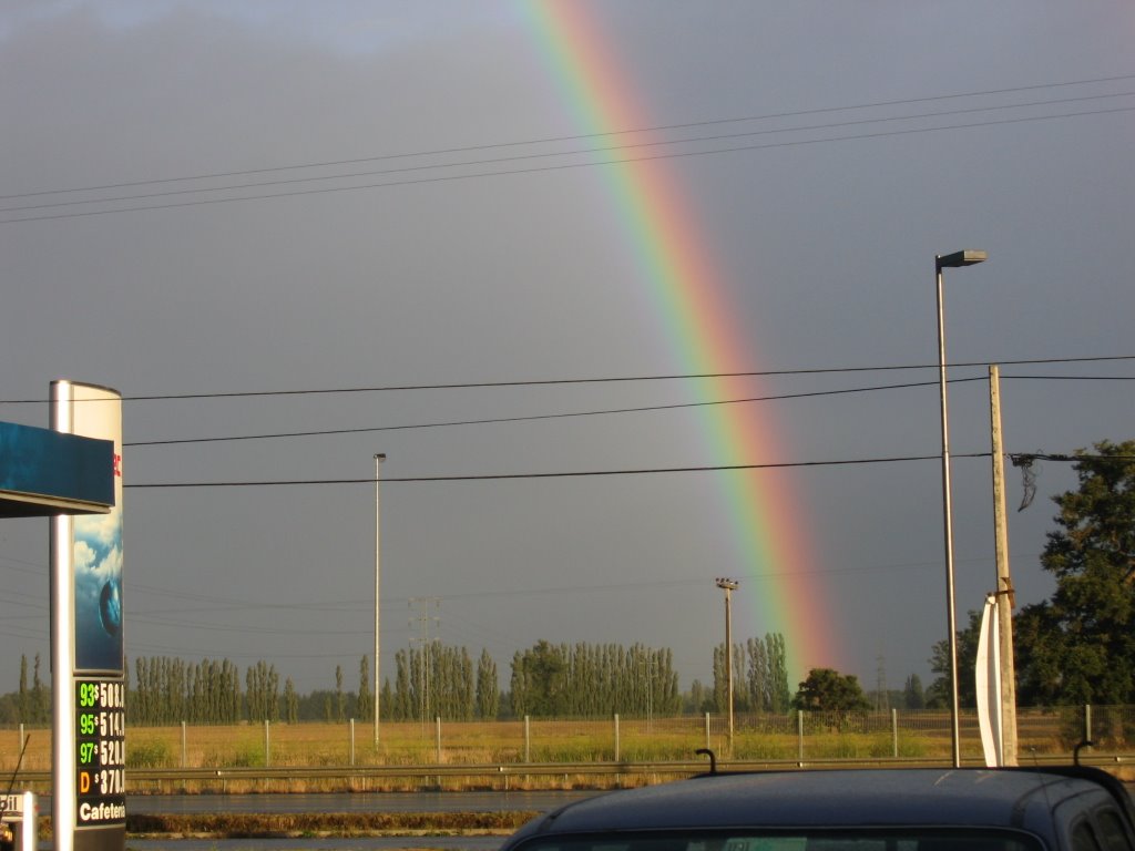 Rainbow.. a summer day going to Osorno, Chile by Albertoiquique