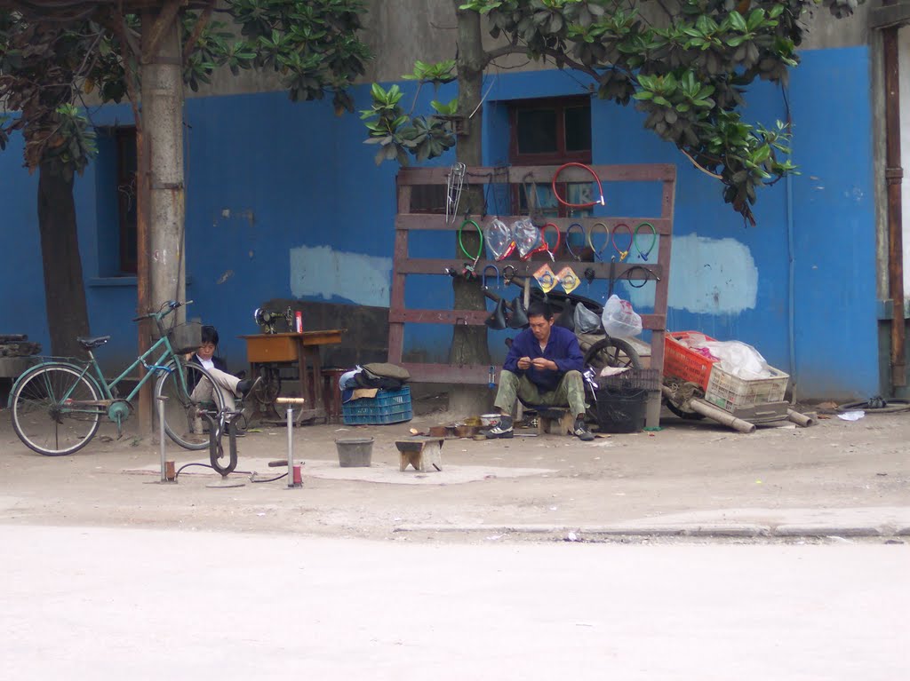 Local bicycle equipment shop and repair station as well by M.Schubert