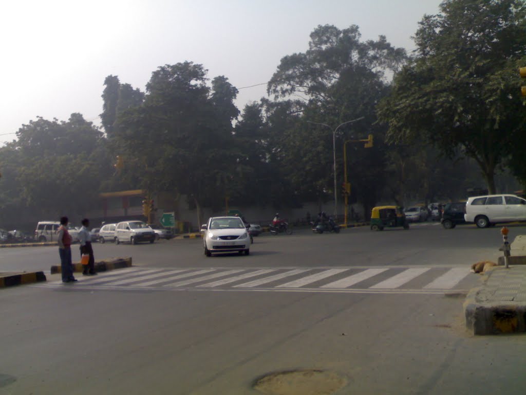 Janpath Intersection, on my right is McD by Samz124