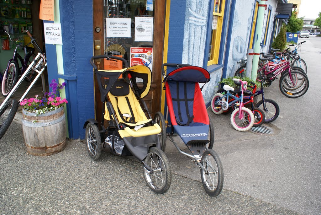 Bicycle repair at Moncton St. 2007 by Edward Ng