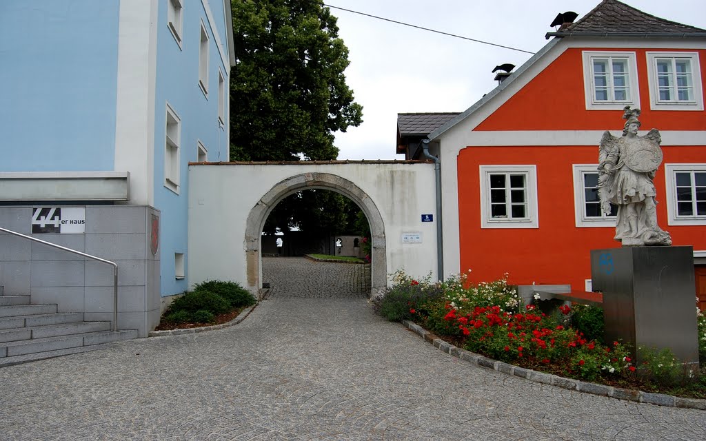 Entrance to the graveyard of St. Michaelskirche, Leonding. by Hans J.S.C. Jongstra