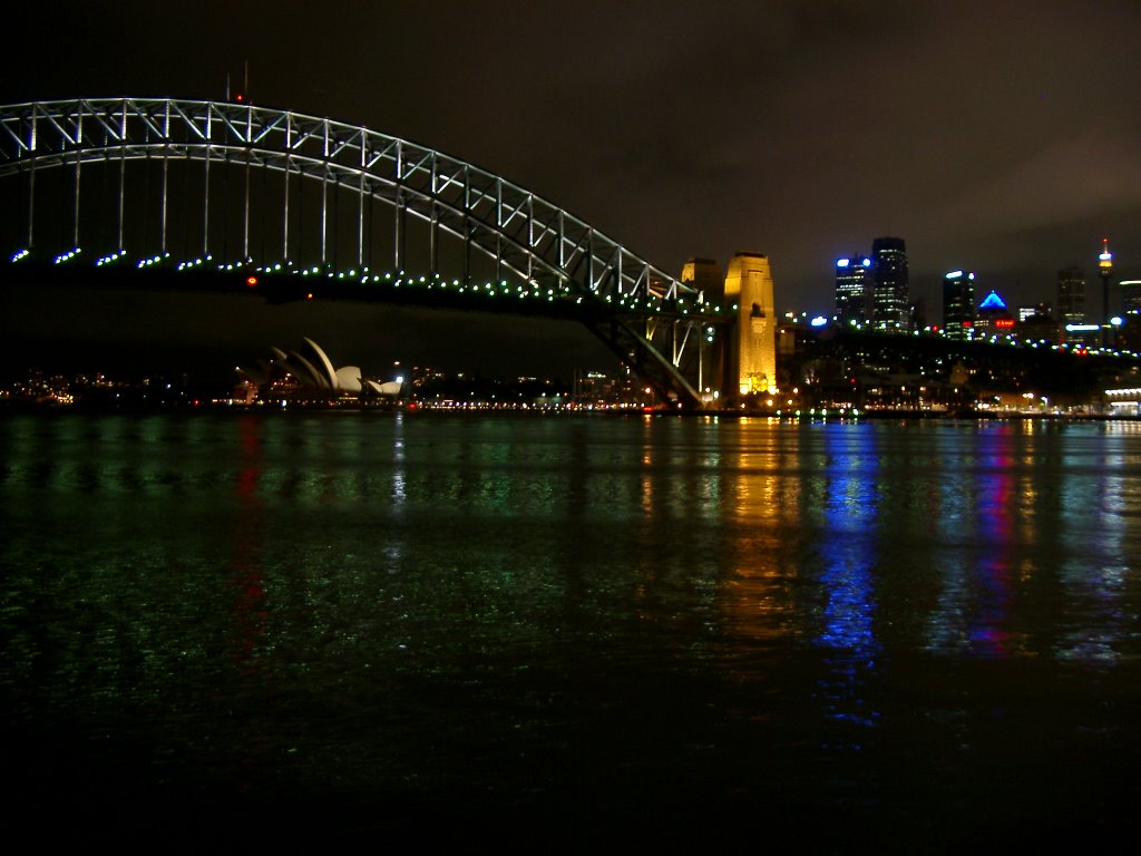 Night shot of Sydney Opera House under Sydney Harbour Bridge by paul_adams777