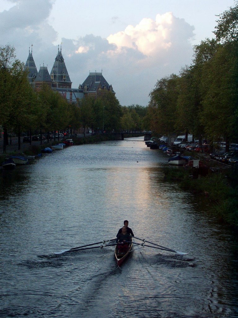 The Rijksmuseum from a canal at night by Jim Mansfield