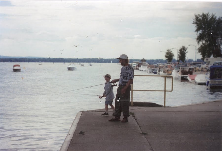 Fishing on dock by Geraldine Clark