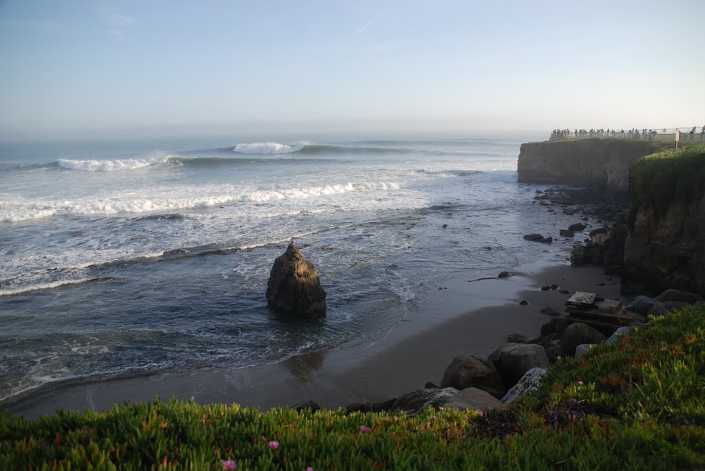 Watching the surfers by Carolyn