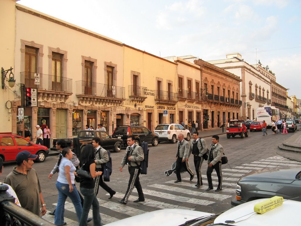 Mexican musicians crossing the street by fotokönig