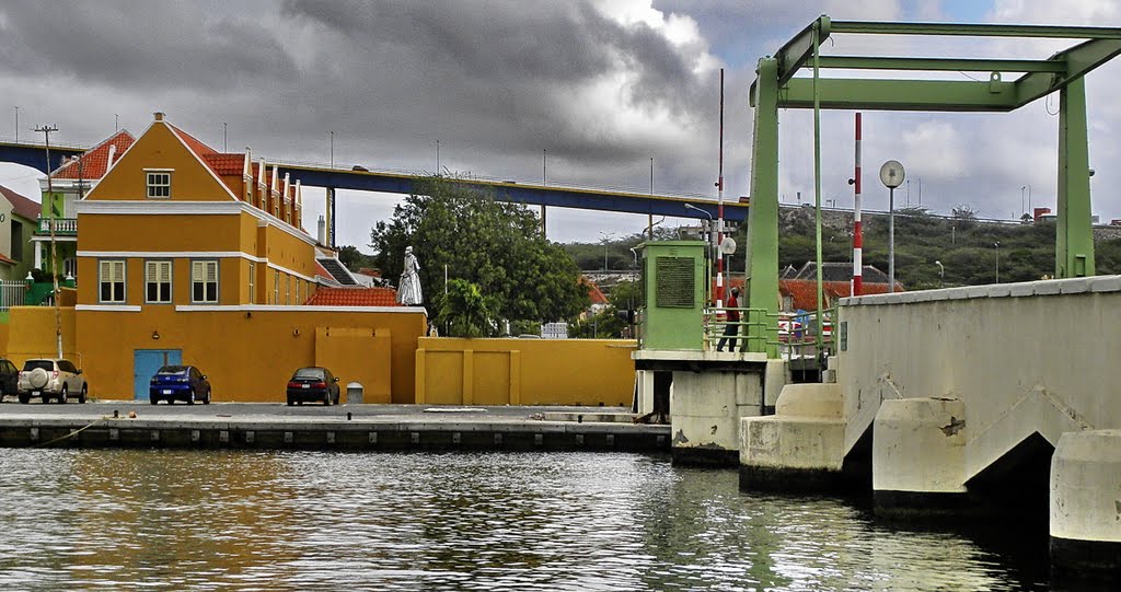 CURACAO.Two wellknown bridges in Willemstad.The drawbridge over the "WAAIGAT" and the QUEEN JULIANABRIDGE over the ANNABAAI. by Feika