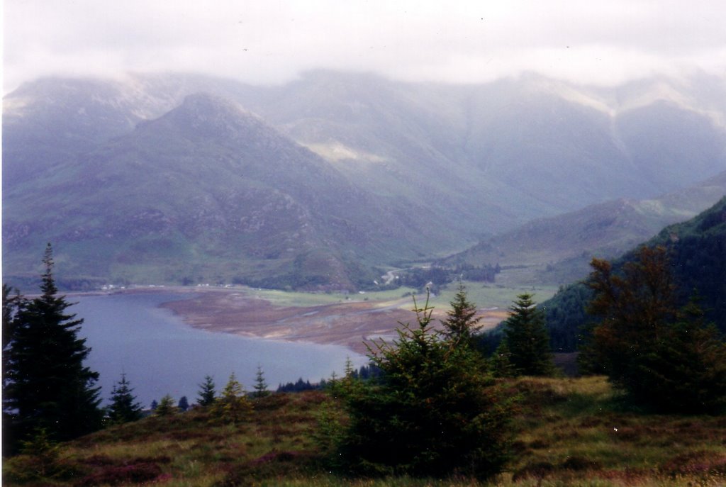 These mountains are known as "The 5 Sisters of Kintail"Scotland by nissie