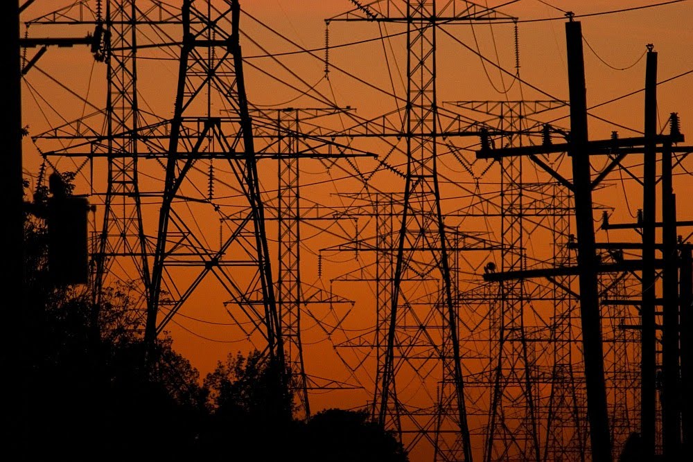 Powerlines at sunset by Eric Schreiber