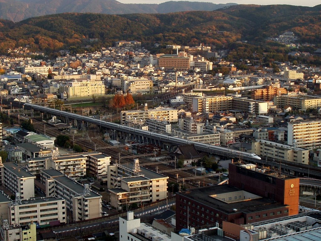 View of shinkansen (bullet train) from Kyoto Tower by sandmonkee