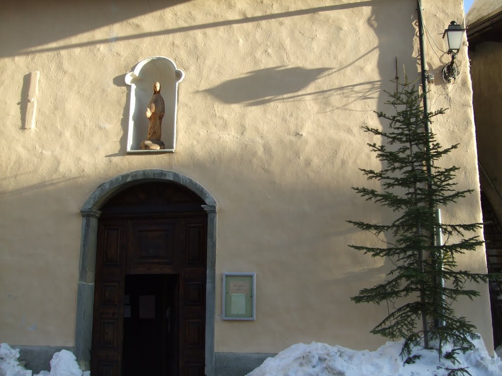 Church Door and wooden Madonna by Alan L.