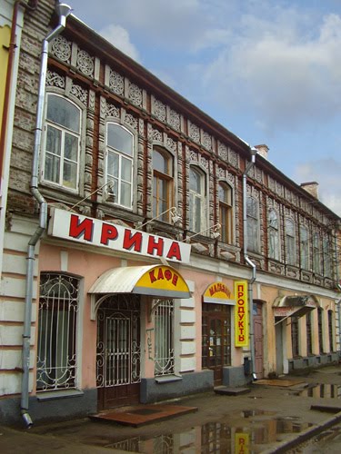 Building with wooden decor on Karl Marx street by IPAAT