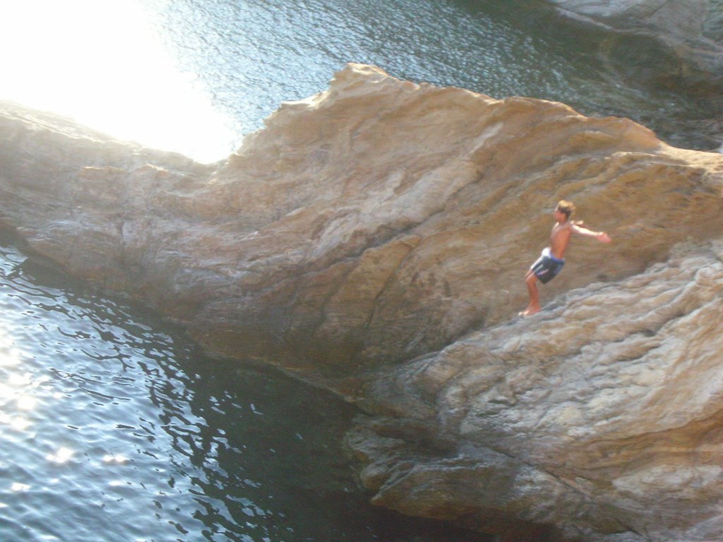 Singa Jump From The Cliff by Mr.Singa