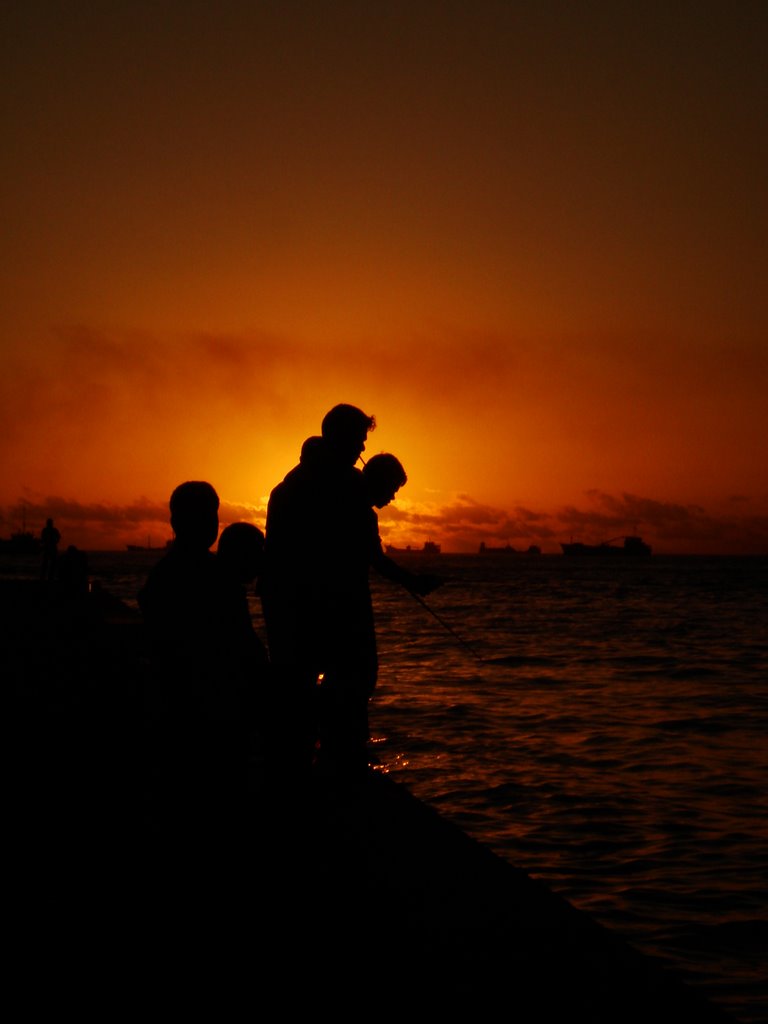 Fishing in the sunset by Munah Ahmed