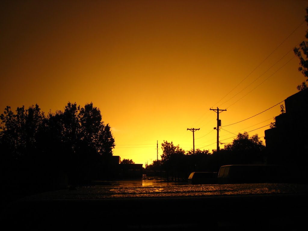 Sunset after rainstorm by S. Ross