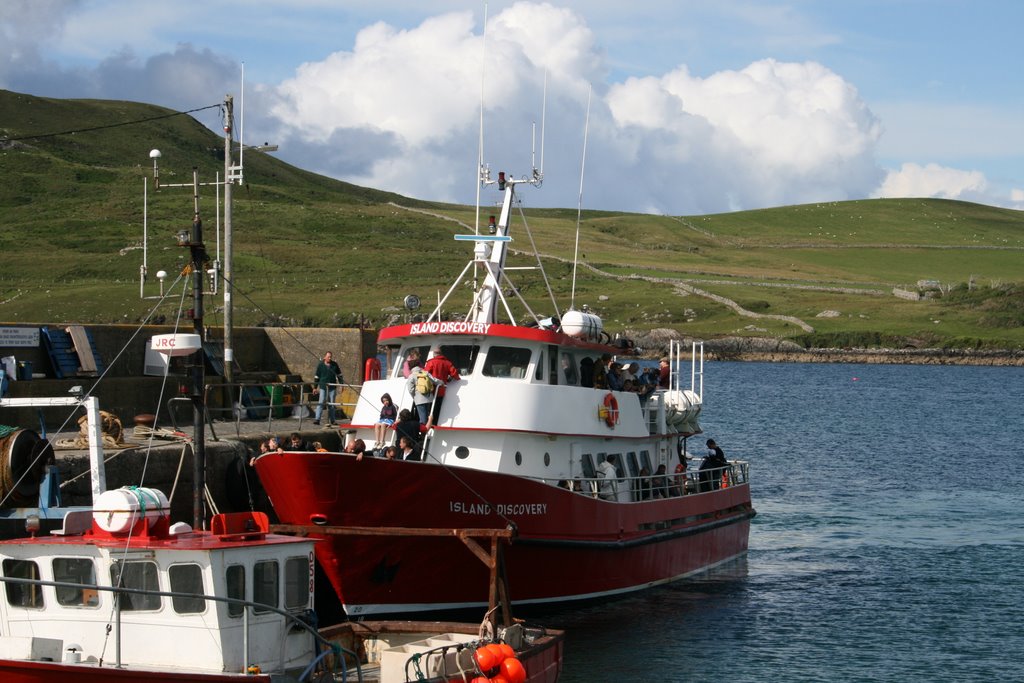 Cleggan quay: Inishbofin ferry arriving by Bert Kaufmann