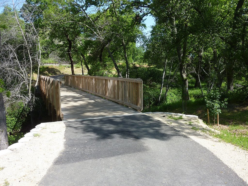 Bike trail bridge and railroad tracks by Eric Phelps