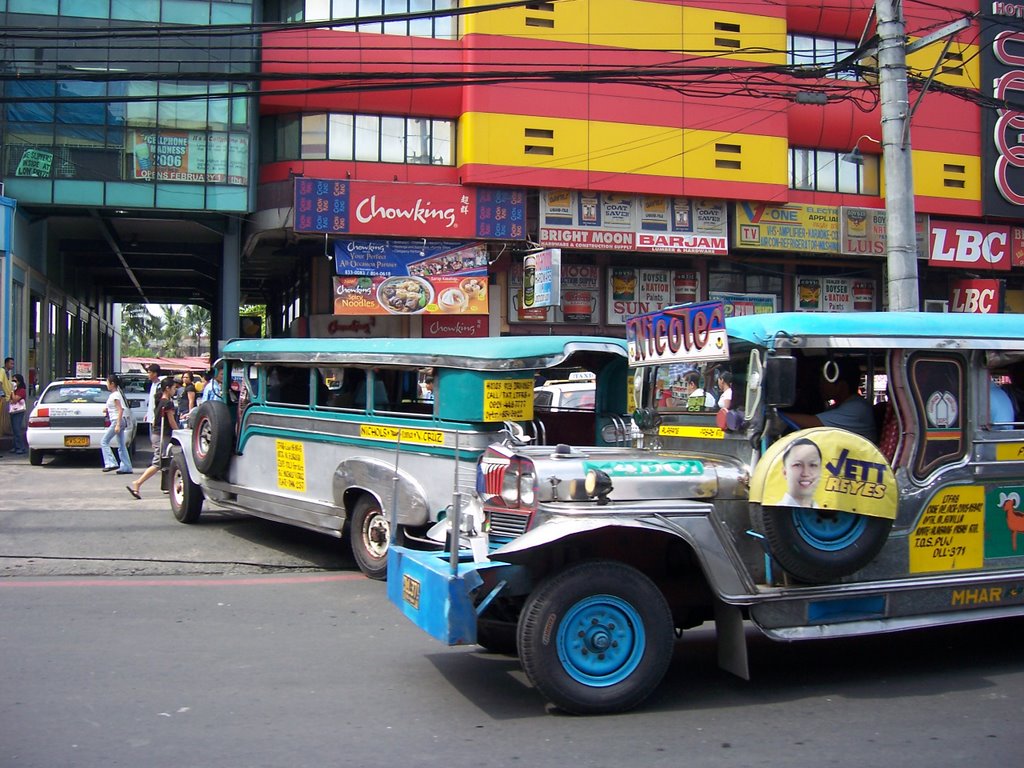 Jeepneys in Manila by HelaineNJ